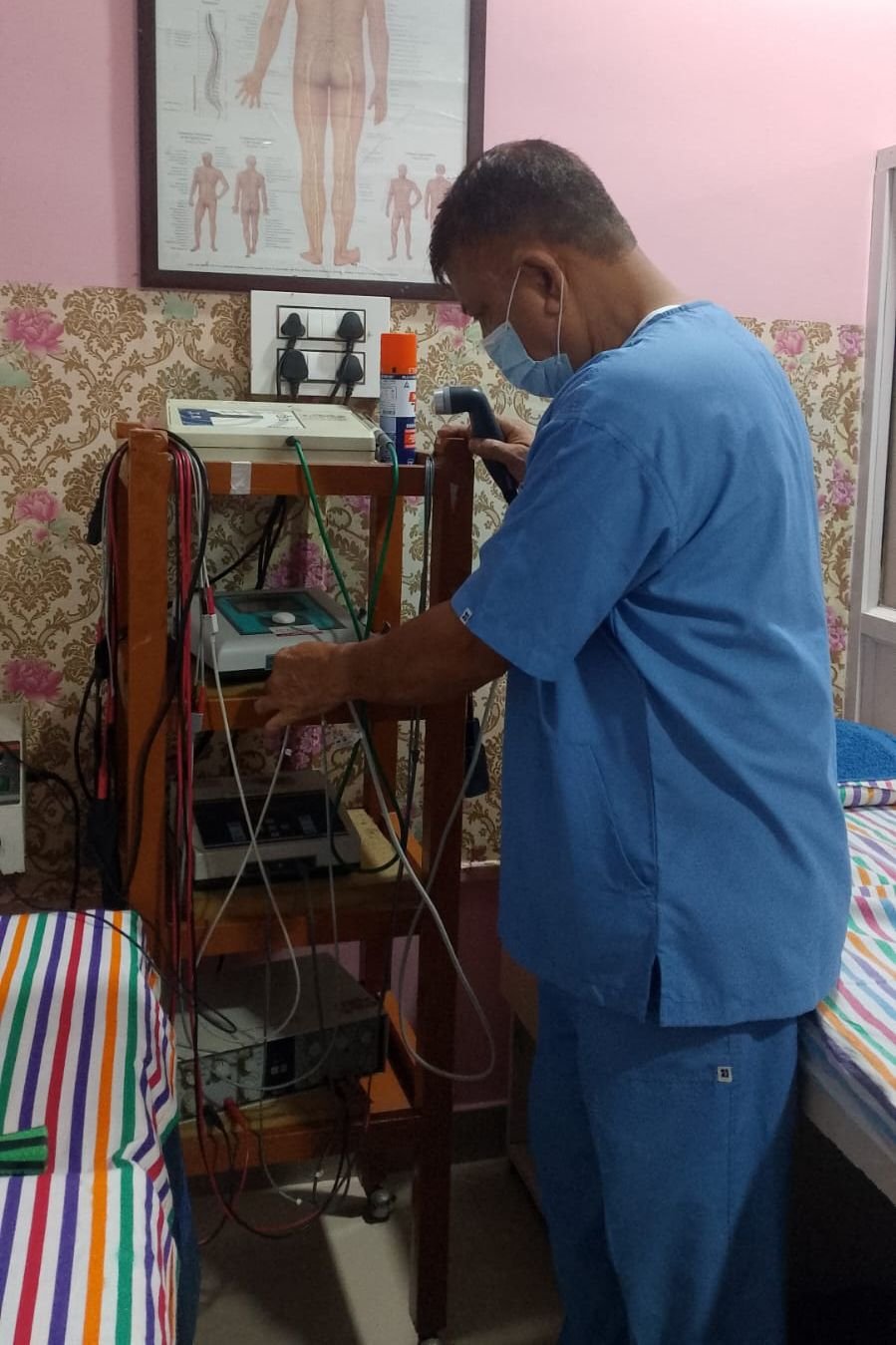 Therapist setting up ultrasound therapy